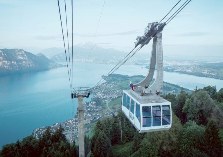 Ascent by cable car to Balnerario 5 stars in the Alps.